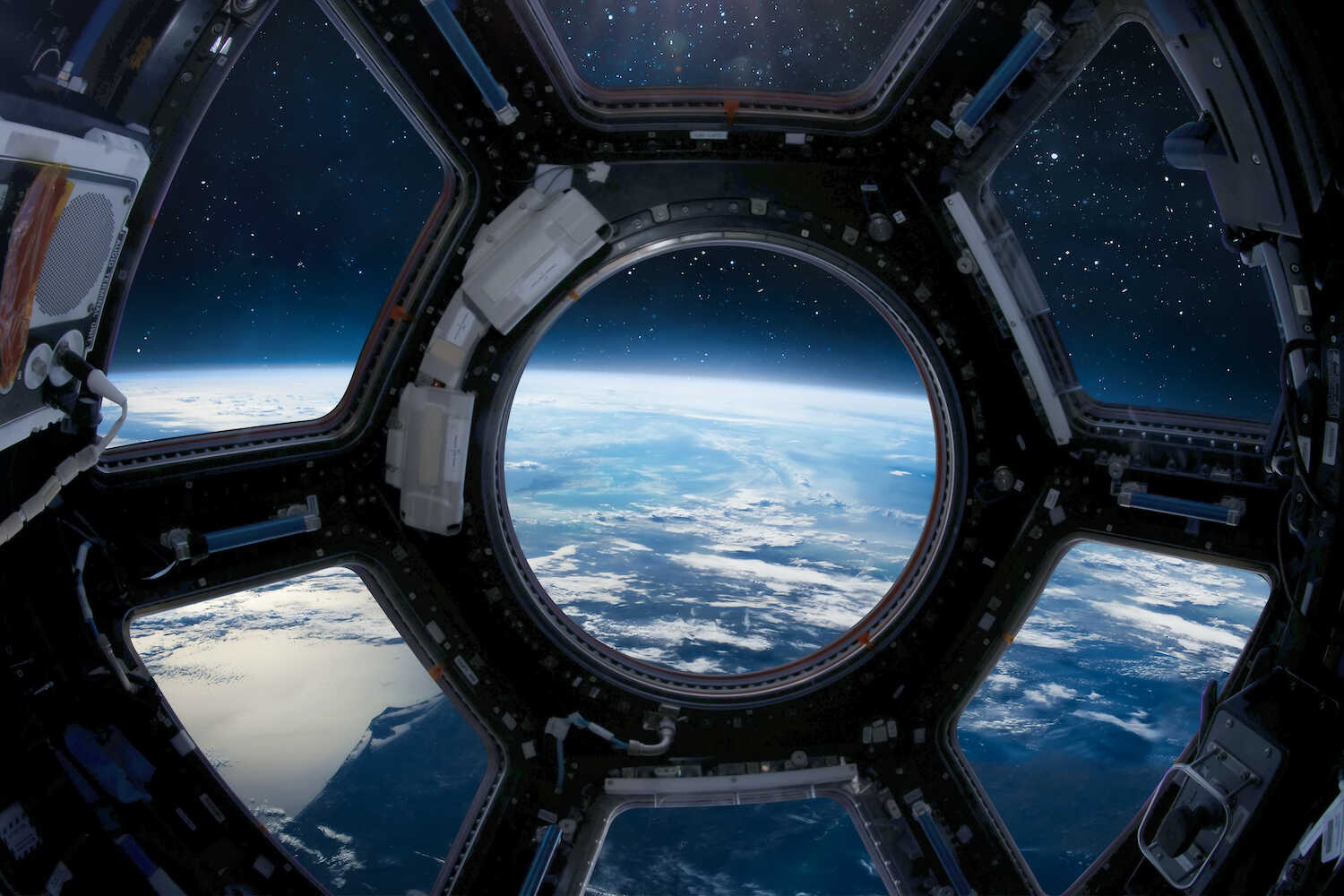 Cupola porthole on International Space Station. Cupola porthole on International Space Station.